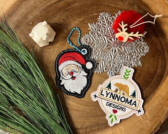 Weihnachtsmannanhänger gestickt: Blauäugiger Weihnachtsmann, Stickdatei