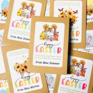 May include: A set of brown paper seed packets with colourful labels that say "Happy Easter" and feature a bunny rabbit and sunflowers. The labels also include the text "Plant these sunflower seeds for the butterflies and bees!" and the sender's name.
