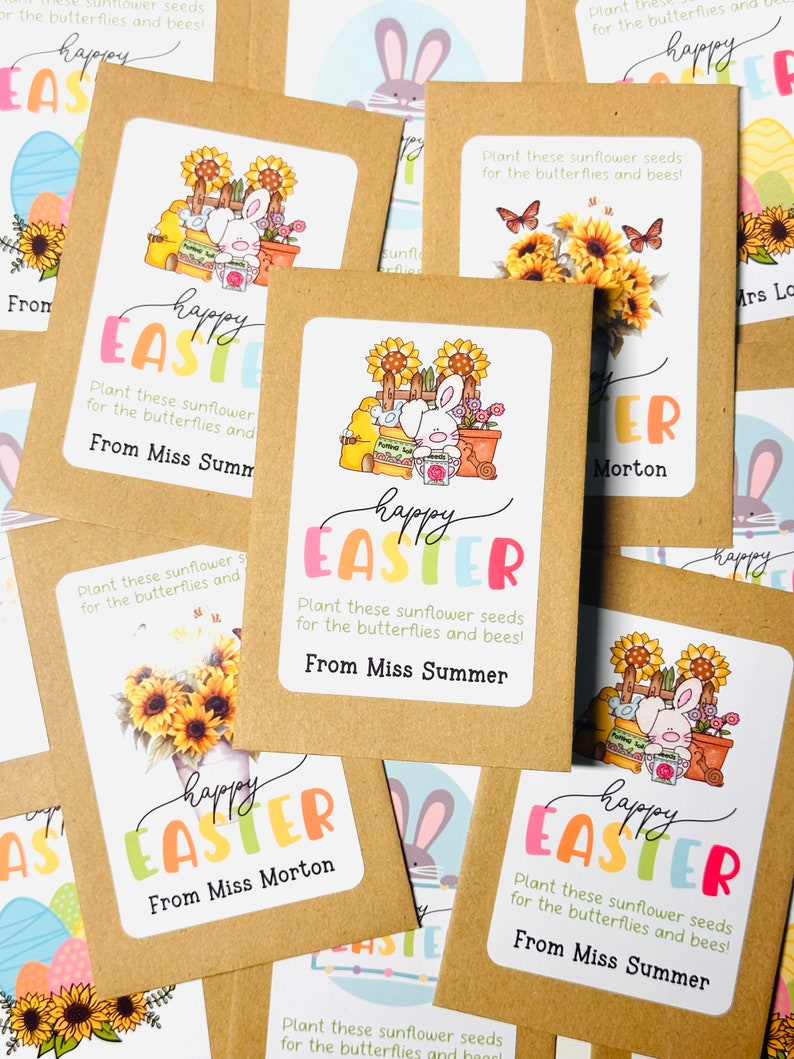 May include: A set of brown paper seed packets with colourful labels that say "Happy Easter" and feature a bunny rabbit and sunflowers. The labels also include the text "Plant these sunflower seeds for the butterflies and bees!" and the sender's name.