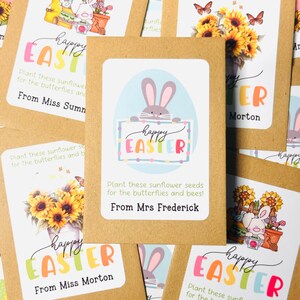 May include: A set of brown paper seed packets with colourful happy Easter greetings and bunny illustrations. Each packet includes sunflower seeds and a message to plant them for the butterflies and bees. The packets are from Miss Summer, Miss Morton, and Mrs. Frederick.