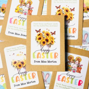 May include: A set of nine brown paper seed packets with colourful labels that say "Happy Easter" and include a sunflower design. The labels also include the text "Plant these sunflower seeds for the butterflies and bees!" and the sender's name.