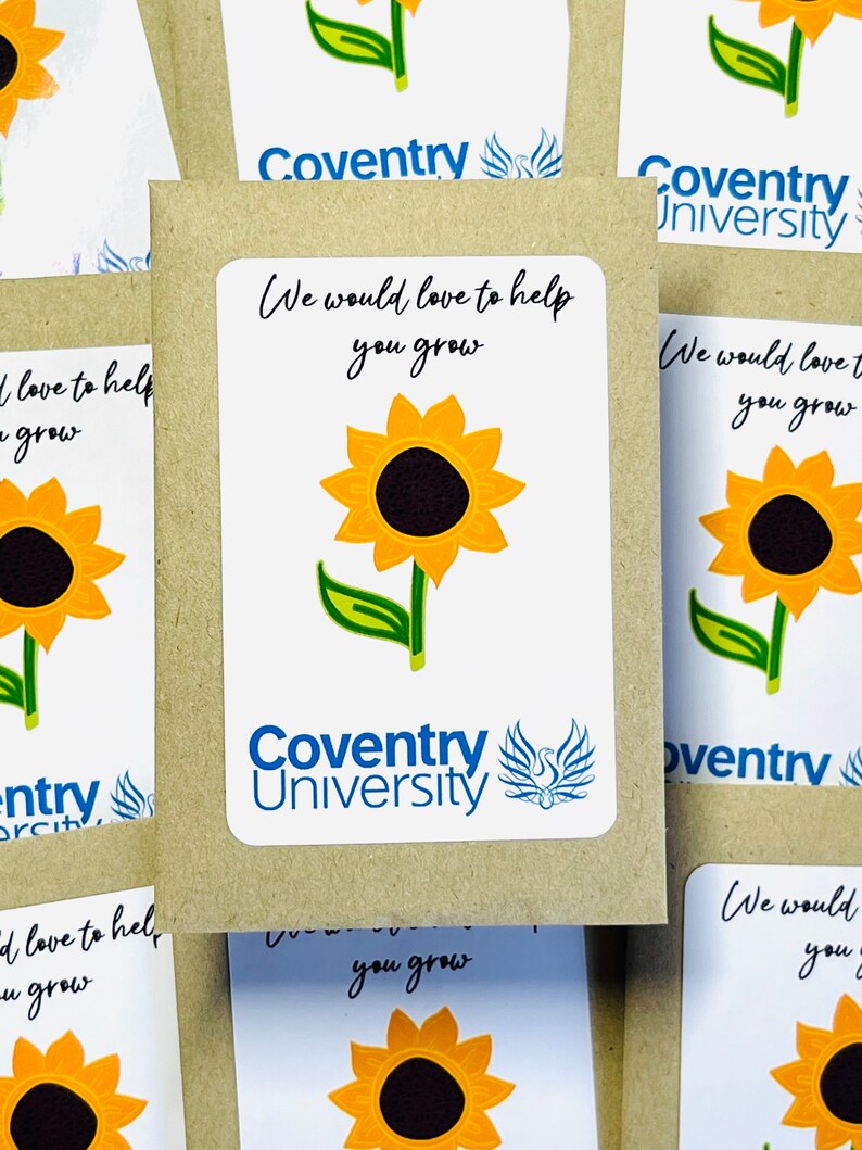 May include: A brown paper packet with a white sticker that says "Coventry University" and features a sunflower and the text "We would love to help you grow".