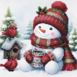 May include: A snowman wearing a red and green hat and scarf holds a cup of hot chocolate. Two red cardinals are perched on a birdhouse in the snowy background.