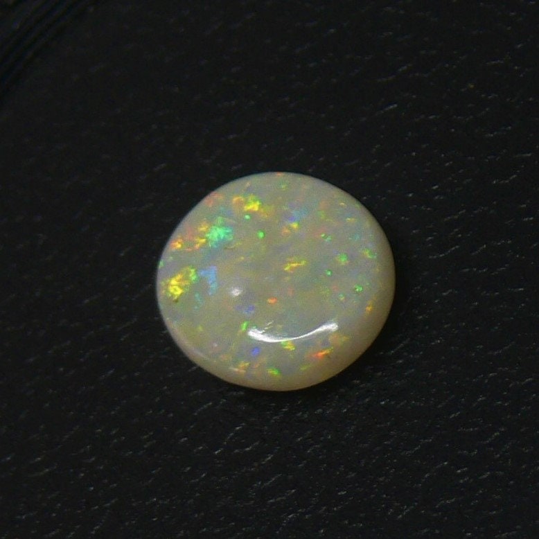 Opal, 4.03 ct, natural, AAAAA, certified unheated gem from Australia with lots of fire. Sparkle with vivid color. Beautiful!