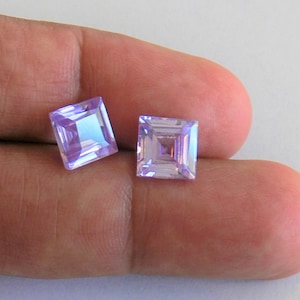 Violet Sapphire, 7x7x5mm, AAAAA, Lab created, gem quality hardness. Signature hand cut to the excellent brilliance. Coating free gem. Nice !