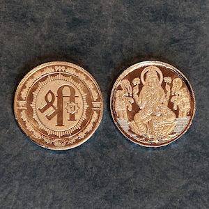 Shri Laxmi Coin 5 g, 99.9 Silver, Shri on one side and Laxmi on other side. Excellent finish & detailed workmanship (USA). Collector&#39;s item.
