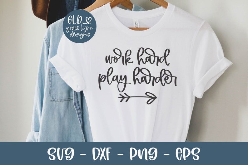 May include: White t-shirt with black text that reads "work hard play harder" with a small arrow underneath.