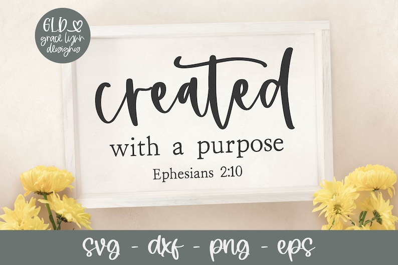 May include: White framed sign with black text that reads "created with a purpose Ephesians 2:10".
