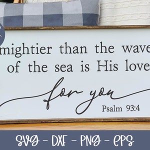 May include: A white wooden sign with the text "Mightier than the waves of the sea is His love for you" and "Psalm 93:4".