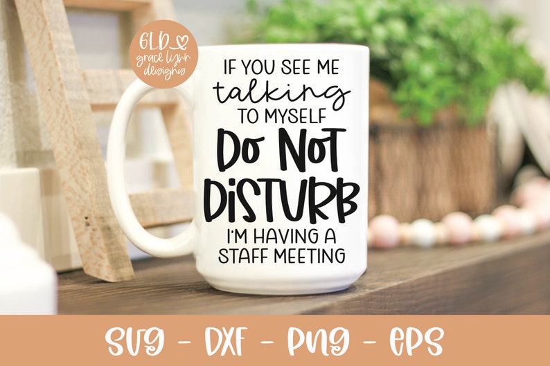 May include: White ceramic mug with black text that reads "If you see me talking to myself Do Not Disturb I'm having a staff meeting".