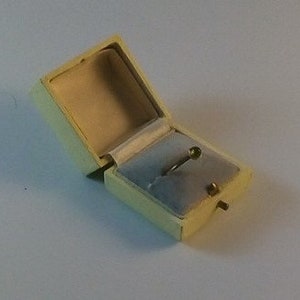 A very stylish gold and peridot ring from the 1970s