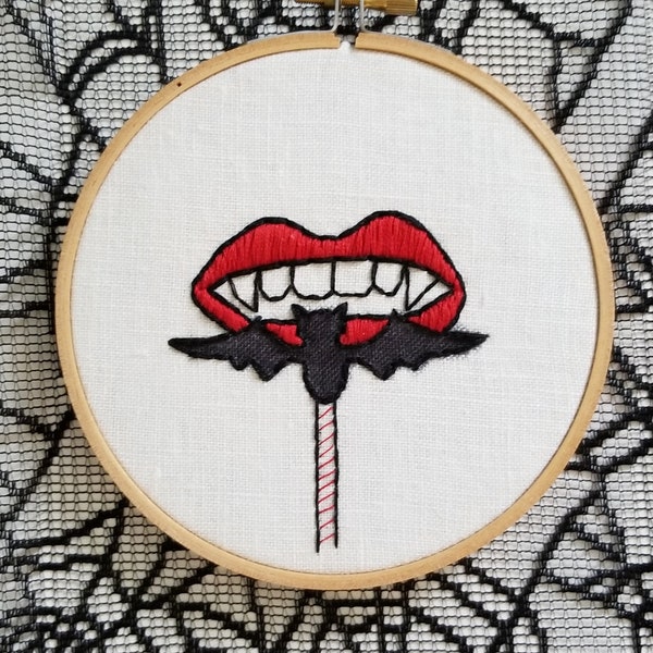 Halloween Candy. Melting Chocolate Bat. Vampire Fangs. Bright Red Lips. Spooky Lollipop Bat. Mixed Media Embroidery Art. Freehand Stitching.