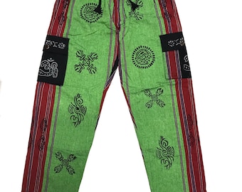 May include: Green and red striped trousers with black patterned designs. The trousers have a drawstring waist and side pockets.