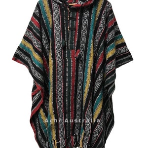 May include: A hooded poncho with a striped pattern in black, red, green, and yellow. The poncho has a drawstring hood and fringe trim.