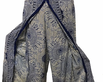May include: Blue and white printed palazzo trousers with a front split. The trousers have a wide leg and a comfortable fit.