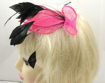 Small pink sinamay fascinator comb ,weddings,races prom