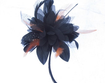 Small black and orange fascinator comb , weddings, races prom or ladies day