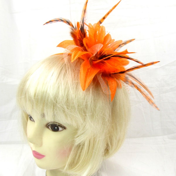 Orange flower tiger print feathers on a headband fascinator, prom ,party