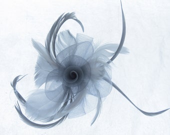 Grey fascinator mesh and feather on a clip , weddings, races prom