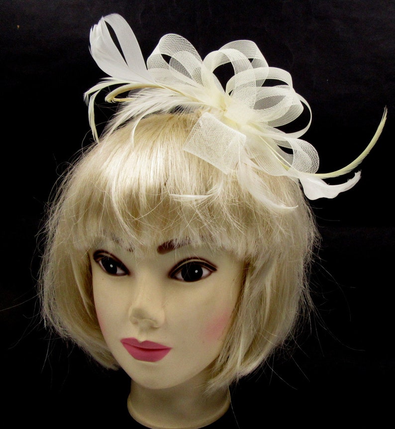 Looped cream net and feather fascinator comb weddings races prom image 1