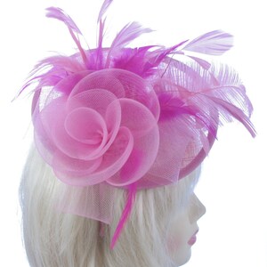 Light pink hat with a touch of hot pink feathers ,lAscot Races, weddings, prom ,ladies day