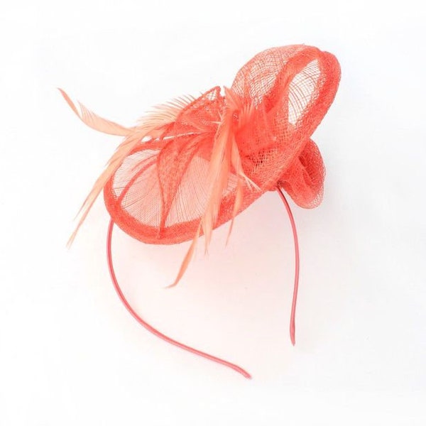 Coral curled fascinator on an aliceband,weddings, races,ladies day prom