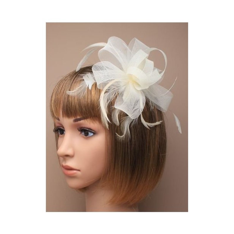 Looped cream net and feather fascinator comb weddings races prom image 4