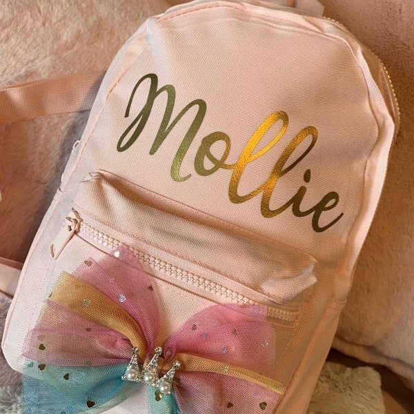 Personalised girls pink backpack. Any name. Back to school, nursery. Toddler rucksack. Heart crown coloured bow.