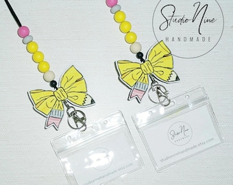 PENCIL BOW LANYARD with clear badge holder and mdf sublimation accent