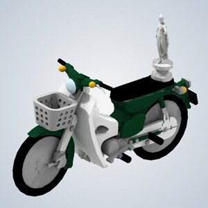 May include: A green and white motorcycle with a basket on the front and a small white statue on the back seat.