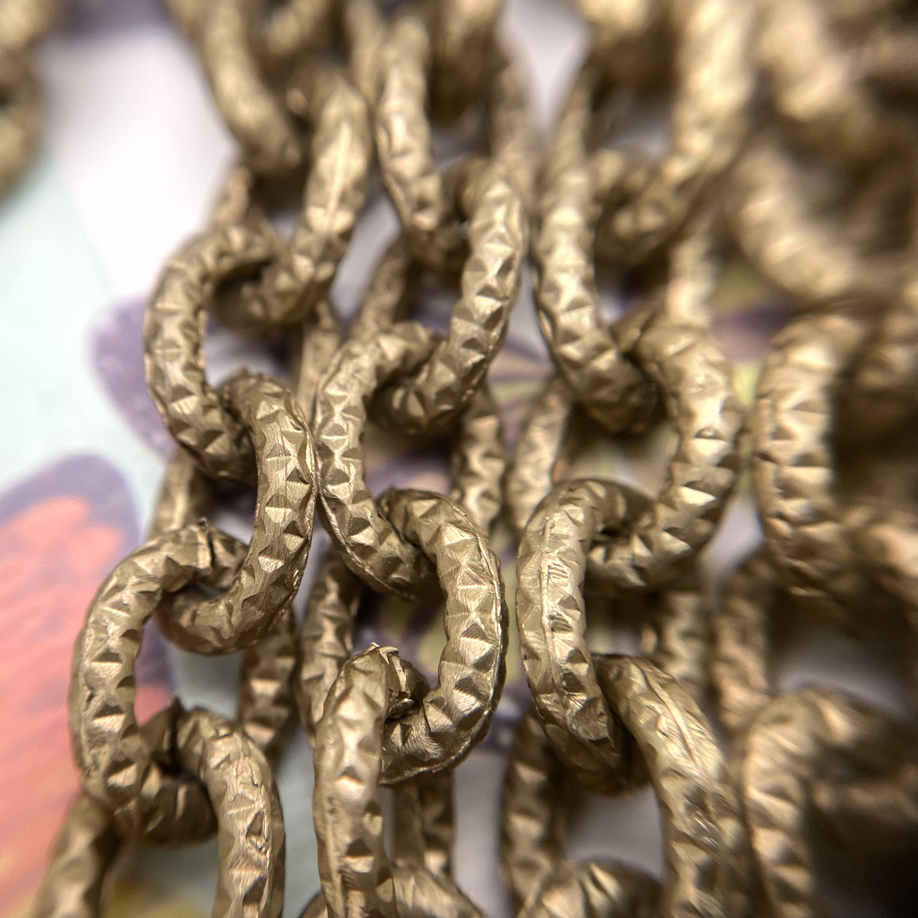 Bronze Color Textured Oval Aluminum Chain 8x10mm (Sold By The Foot) (ALUM36)