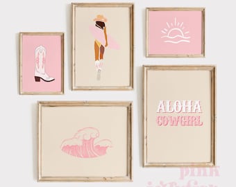May include: Five framed prints with a pink and white color scheme. The prints feature a cowboy boot, a woman in a cowboy hat, a sunset, a wave, and the text "Aloha Cowgirl".