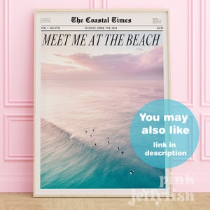 May include: A vintage newspaper style print with the headline "Meet Me At The Beach". The image shows a beautiful sunset over the ocean with surfers riding waves.
