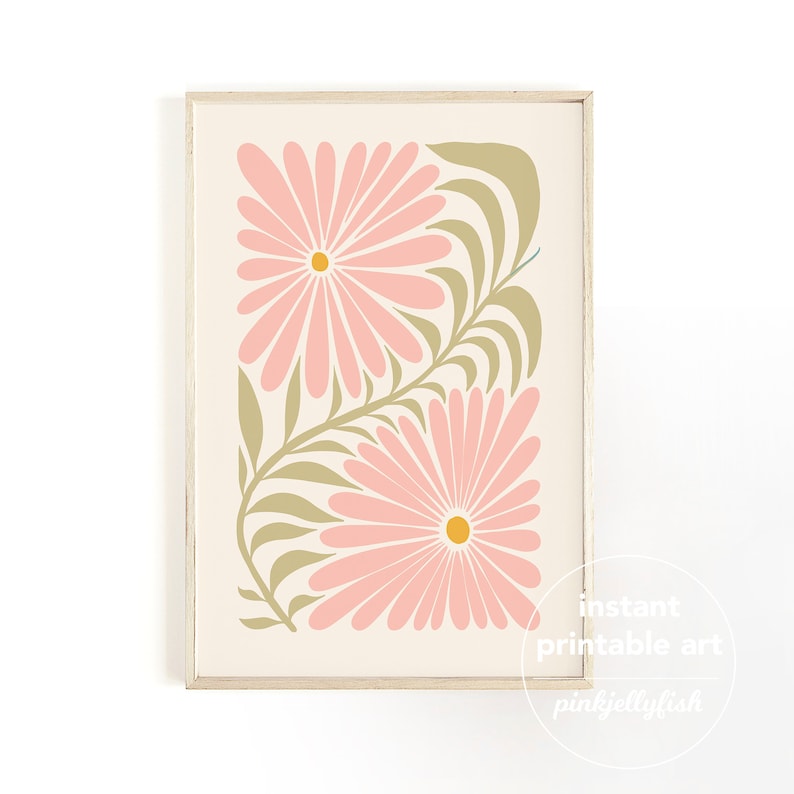 May include: A framed floral print featuring two large pink daisy-like flowers with yellow centers and olive green leaves on a cream background. The print is labeled "instant printable art" and "pinkjellyfish".