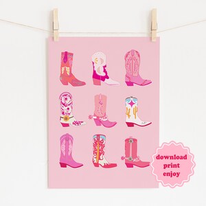 May include: A pink poster featuring nine illustrated cowboy boots in various designs and colors, including pink, white, and orange. The boots are arranged in a grid pattern against a pink background. The text "download print enjoy" is in a pink bubble.