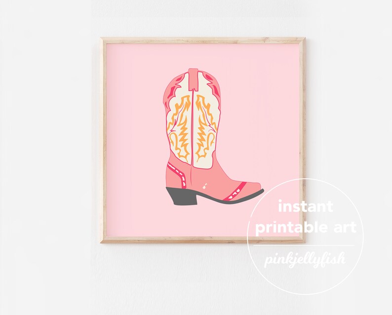 May include: Pink cowboy boot with yellow and white stitching on a pink background. The text "instant printable art" and "pinkjellyfish" is below the boot.