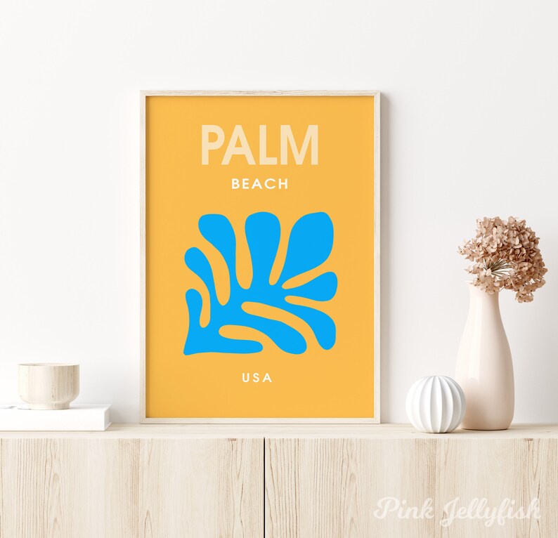May include: A yellow poster with the text "PALM BEACH USA" and a blue stylized leaf design.