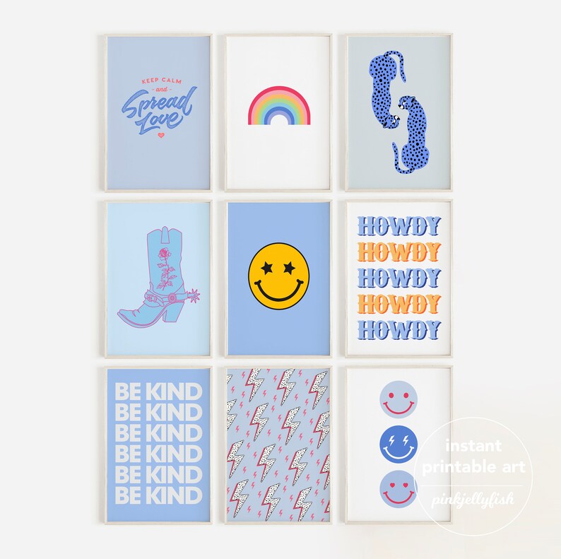May include: Nine framed art prints with various designs. Prints include a rainbow, smiley faces, a cowboy boot, and text that reads "Keep Calm and Spread Love," "Howdy," and "Be Kind." The prints are in shades of blue, white, and orange.