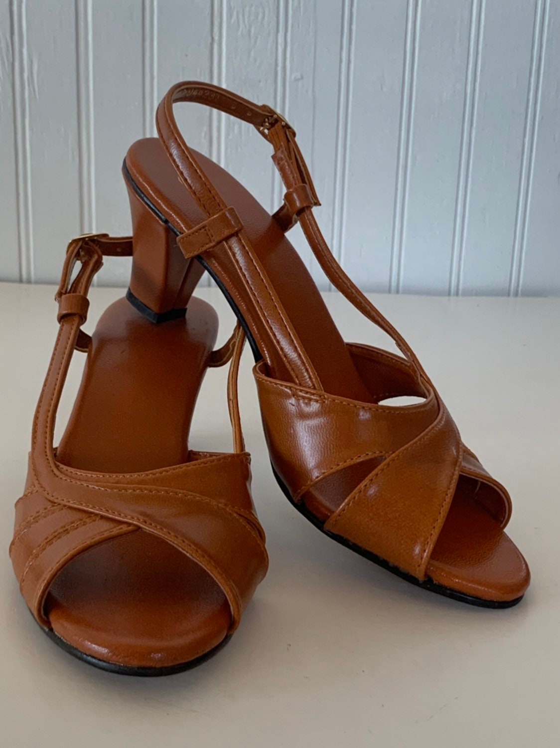 gold t strap flats