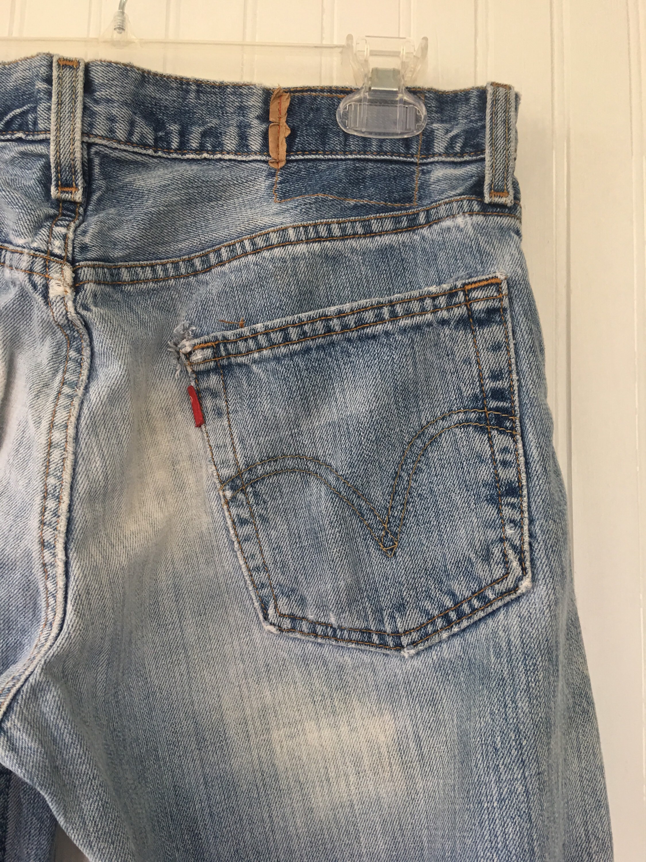 levi jeans with holes in the back