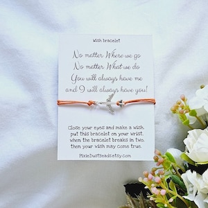 May include: A wish bracelet with an airplane charm and a card that reads "No matter Where we go No matter What we do You will always have me and I will always have you!" Close your eyes and make a wish, put this bracelet on your wrist, when the bracelet breaks in two, then your wish may come true. PixieDustBeads.etsy.com"