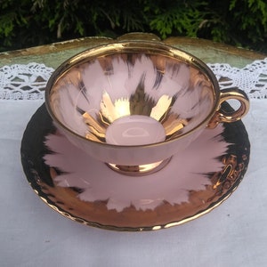 Lovely pink/gold demitasse vintage teacup and saucer