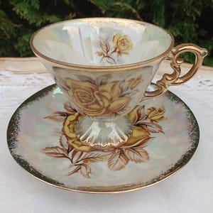 Large Lusterware teacup with yellow roses, September