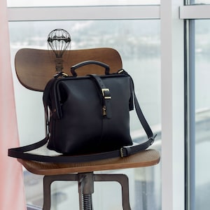 Black Top Handle Handbag for a Woman: Customizable Stylish and Versatile Fashion Accessory