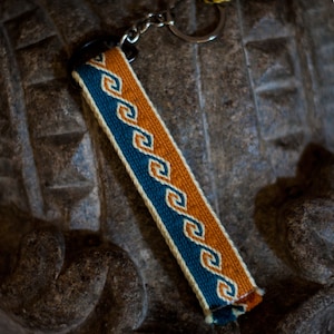 Keychain made of board border 100% cotton. Unique