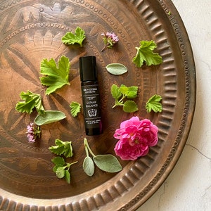 Luna balance, hormone support, PMS, menopause relief essential oil, roller blend, vegan, alcohol free.