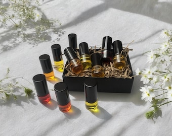 Set of five artisan natural botanical vegan perfume. Extracts of resins, barks and plant alchemy. Parfum Botanique.