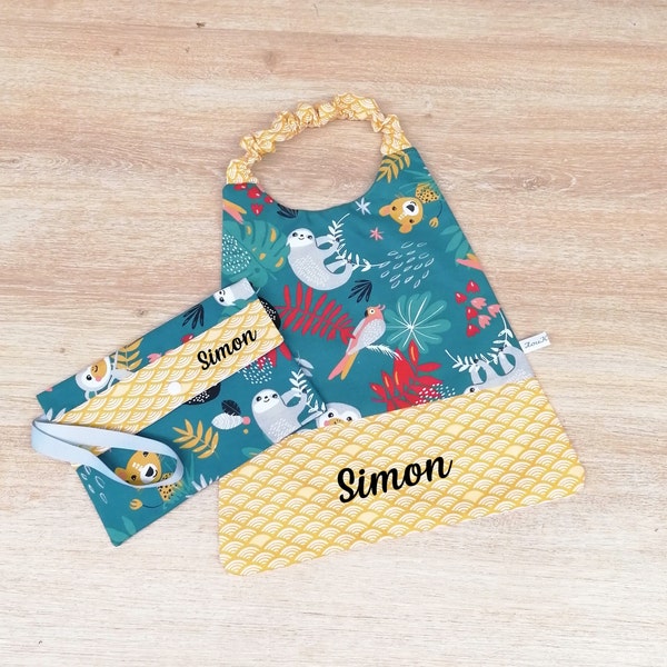 Elasticated child napkin with first name with its matching pouch perfect for the canteen in kindergarten