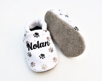 Customizable baby slippers with non-slip leather sole and white cotton upper with animal paws