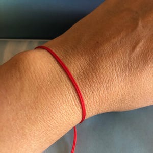 Bracelet ficelle rouge : amulette du bon karma, Kabbale Feng Shui